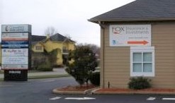 image of exterior of office building - look for the orange awning